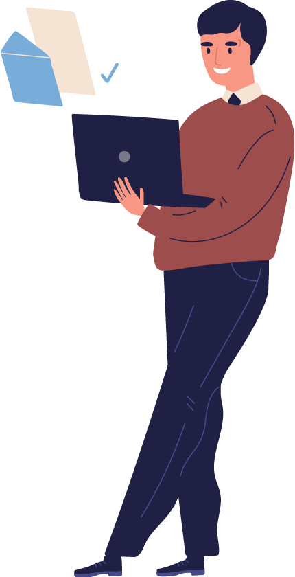 Man sitting on a couch with a laptop, wearing a red sweater and beard, looking at the screen in a living room setting